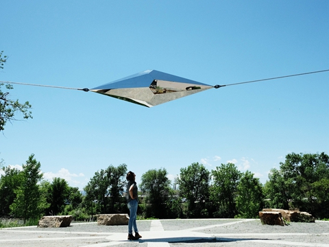 Mirror Polished Steel Sculpture - Infinite Span installed in Grant Frontier Park, Denver.